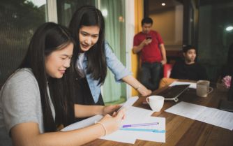 asian younger studying woman talking working friend