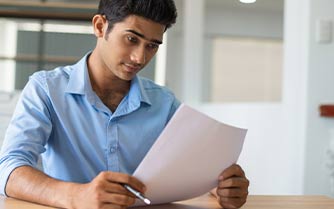 a person holding a piece of paper